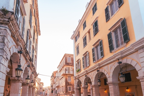 Warm,Golden,Light,Illuminates,Historic,Corfu,Street,With,Venetian,Arches