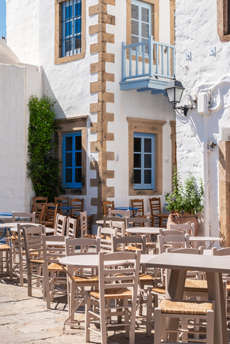 Wooden,Outdoor,Furniture,Of,Street,Cafe,In,Old,Greek,Town.