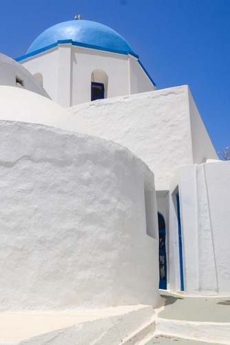 White,Greek,Church,With,Blue,Dome,In,Lagada,Village,On