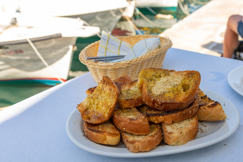 Grilled,Wheat,Bread,With,Herbs,And,Olive,Oil,On,A