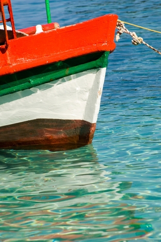 A,Colourful,Fishing,Boat,In,The,Harbour,In,Loggos,,Paxos,