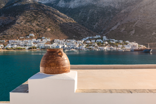 Traditional,Greek,Flower,Pot,On,The,Roof,Of,The,House