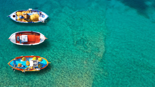 Aerial,Top,Down,Photo,Of,Traditional,Wooden,Fishing,Boat,Anchored, Spetses
