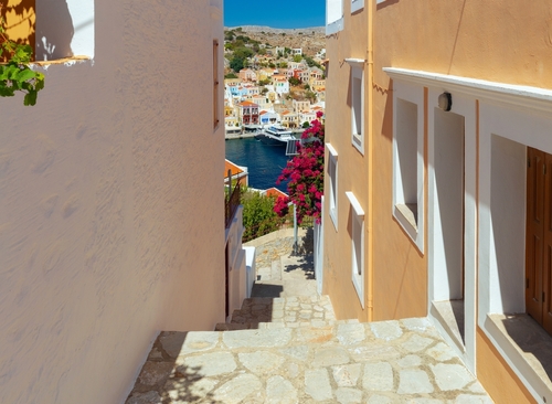 Old,Narrow,Traditional,Street,In,The,Greek,Village,Of,Symi.