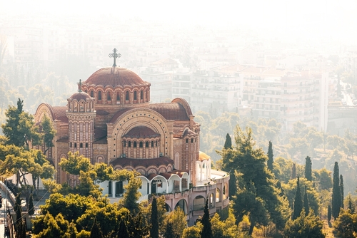 View,Of,Greek,Church,Of,Saint,Pavlos,Flying,In,The